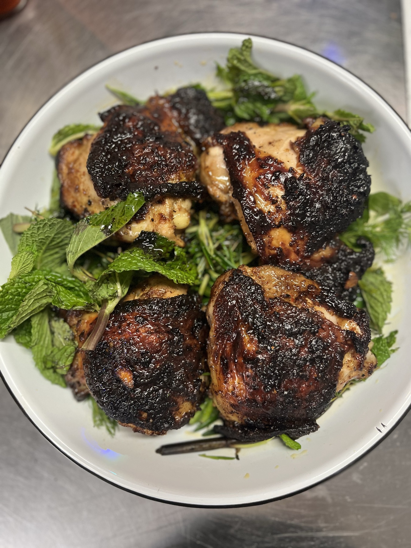 Charred hearth dish with fresh herbs